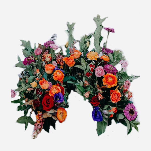 Flower arrangement featuring mixed colorful blooms